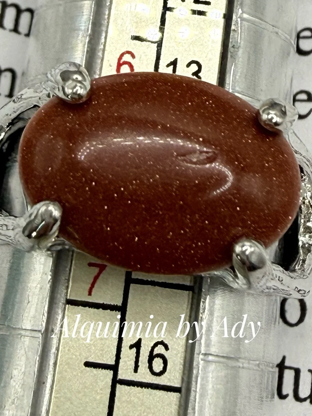 Sparkling Brown Goldstone Oval Ring in Silver-Tone Setting